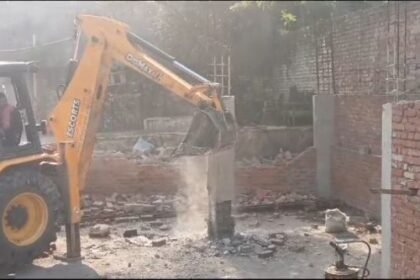 Bulldozer action seen on a building under illegal construction in Fatehpur district of UP.