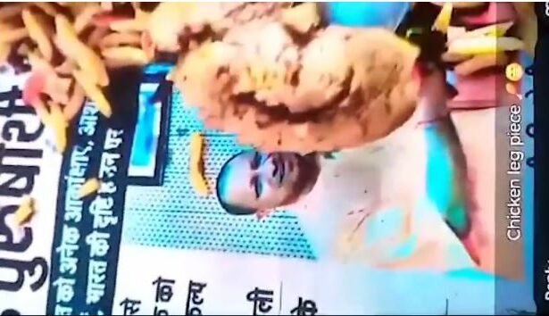 Video of Yogi eating meat on photo goes viral, FIR against accused Firoz