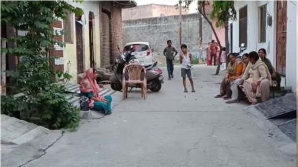 In Muzaffarnagar, a woman along with her daughter staged a sit-in outside her in-laws' house