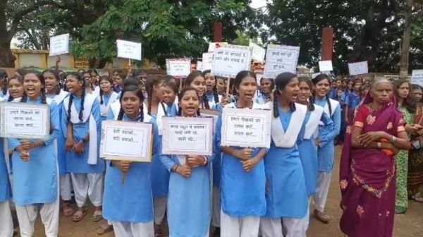Opposition to merging of girls' school in Rajim, girl students locked the gate
