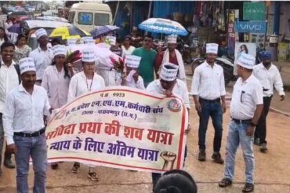 NHM union took out a funeral procession rally amidst heavy rain