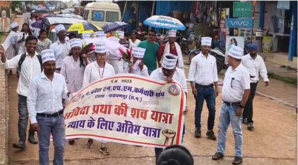 NHM union took out a funeral procession rally amidst heavy rain