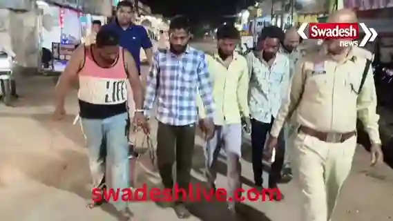 The robbers' procession: They had their hair cut and chanted slogans like, "Looting is a sin, the law is our father."