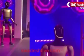 elon-musk-dances-with-robot-trillion-dollar-pay-package-tesla-optimus-robot-army-poverty