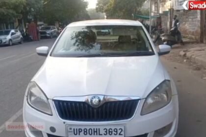 Unique incident in Agra: Car driver wearing helmet continues driving after getting challaned