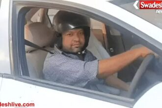 चालान से बचने के लिए हेलमेट पहनकर कार चलाते दिखे शिक्षक, आगरा पुलिस व्यवस्था पर उठे सवाल