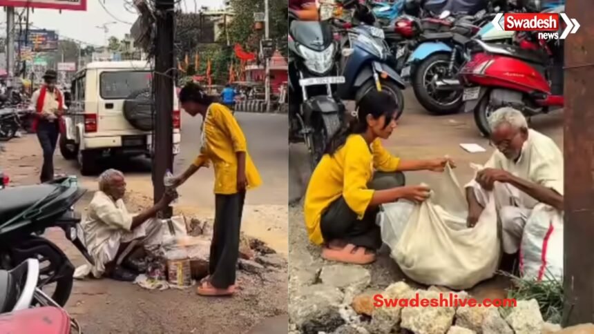 A 92-year-old elderly man selling goods on a footpath in Dhanbad despite financial hardship.